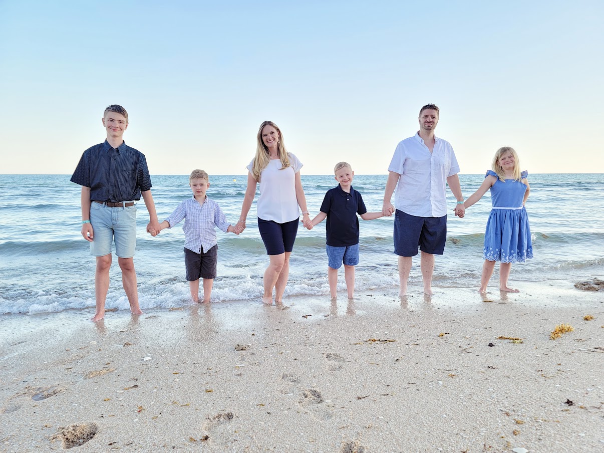 photo of jerimiah baldwin's family on the beach